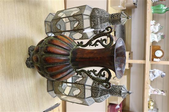 A pair of pierced octagonal lanterns, height 53cm and a metalware vase